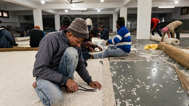 Hand tufted rug manufacturing process showcasing skilled craftsmanship and precision